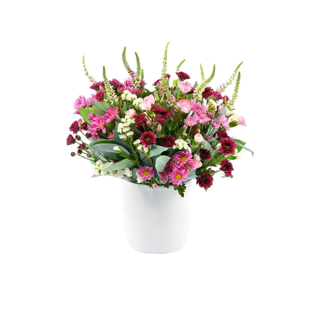 Arreglo Lilas y Rosados en Cerámica Blanca
